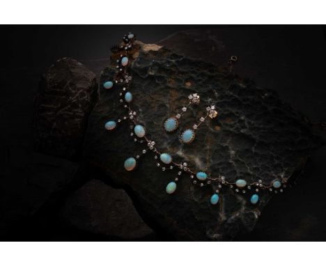 An Edwardian opal and diamond fringe necklace, in original case, together with a pair of associated opal and diamond ear pend