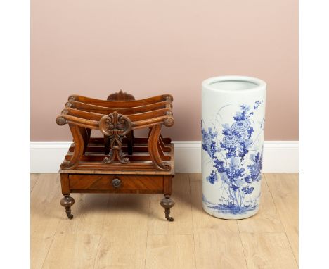 The shaped superstructure with carved foliate roundels to the top, matched on the handle to the frieze drawer, raised on turn
