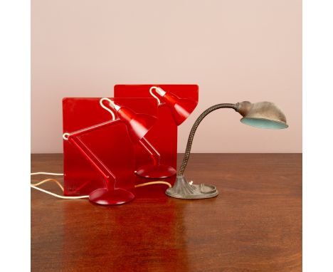A 'Supreme' adjustable desk lamp with metal shade; together with a pair of Anthony Dickins '50' Anglepoise lamps in red plast