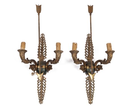 The twin scrolling branches of classical ornament and with two adjustable shades, each supported by an arrow.The shades 38cm 