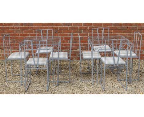 With a later glass top, together with eight matching chairs. The table being able to split into two separate tables.Table 134