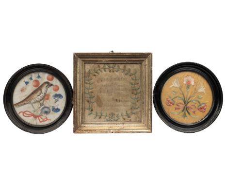 The first a silkwork sampler of a verse from Corinthians in French, in an oak leaf wreath; together with a bird painted on ve