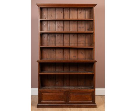 The top tier with three adjustable shelves, raised on a base with two shelves above a pair of cupboard doors.160.5cm wide x 3