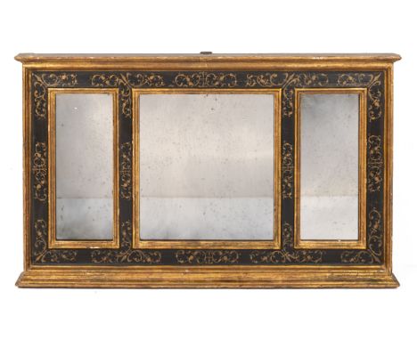 With three panes surrounded by ebonised frame with painted scrolling decoration.43cm high x 72cm wideSome light silvering to 