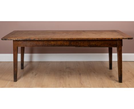 With a five-plank top, the frieze with a drawer at one end, raised on square section legs.214cm wide x 84cm deep x 77cm highS