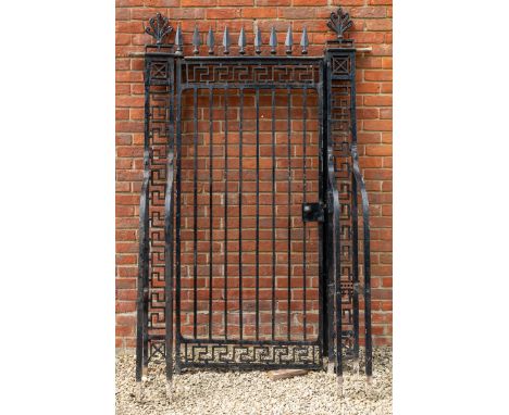 The iron gate and supports in the Greek revival style, with anthemion finials, greek key ornament, and spearhead tops to the 