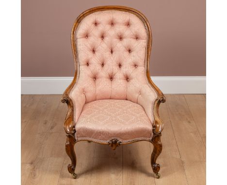The button back upholstered in a pink damask with outscrolling arms and cabriole legs.64cm x 95cmSome sun bleaching notable p