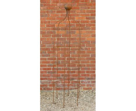 The wrought iron plant support of circular section and with ball finial.62cm diameter x 200cm high