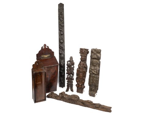 A collection of carved wood elements, the first element of fruiting floral carved decoration, one of the Virgin and Child, on