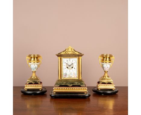 The clock's porcelain dial with Gothic chapter ring over a seated courting couple, Mougin gong striking movement and architec