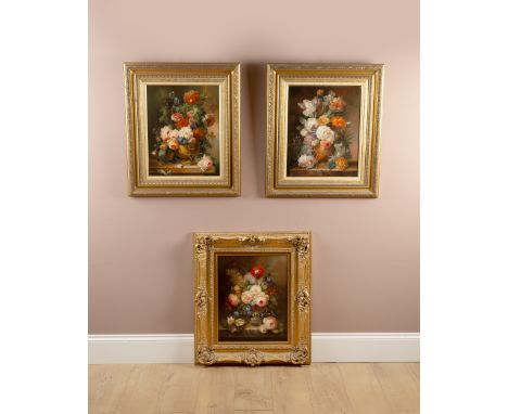 The pictures consisting of a pair of still lifes with a variety of flowers in vases on a stone shelf, bearing signatures 'Emi