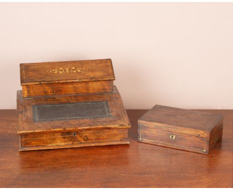 Two writing slopes, the first burr walnut, the superstructure with a hinged lid opening to reveal a desk organiser with cubby