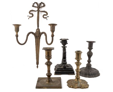 To include a bronze candlestick with a body of dolphin form on a square plinth base; a pewter candlestick with a twisted flut