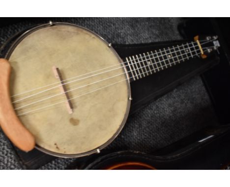 A traditional banjolele with case