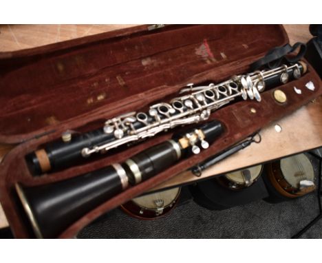 A vintage Adler and Co clarinet stamped Louis de Leuww, Zwolle, possibly Dutch retailer