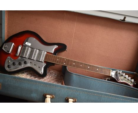 A vintage electric guitar, (Teisco) Tuxedo Three
Very high action , elecs seem to work , basic test only