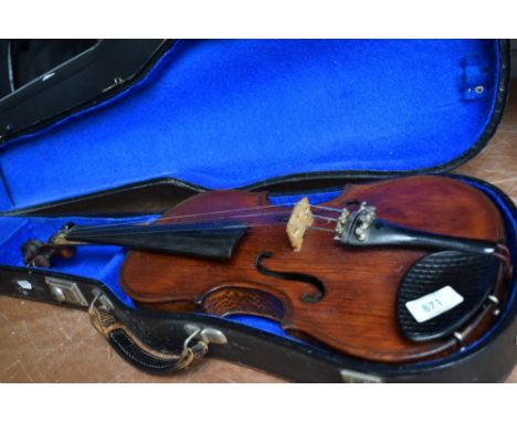 A composite violin having two piece 14inch back, no visible stamps, with vintage hard case.