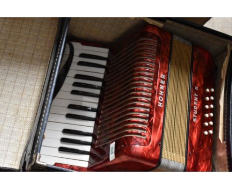 A vintage Hohner Piano Accordion , Student II model, with case
In good condition commensurate with age and use, does have som