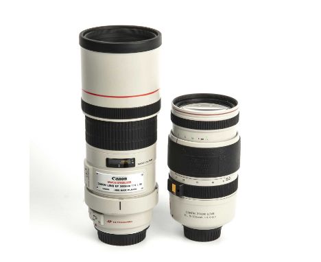 A Canon lens EF 300mm f/4 L IS, together with a Canon 200m lens CL 8-120mm VL 15X (2)No scratches. Untested. No boxes