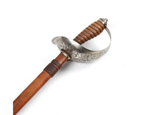 A REPLICA 1908 pattern British Cavalry officer's sword, with a leather grip, the etched blade 87.5cm in length together with 