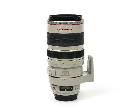 A Canon lens EF 100-400mm f/4.5-5.6 L IS with an ET-83C hoodCondition good. No scratches to glass. Rubber with some minor dis