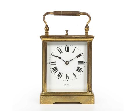 A Late 19th century French carriage clock with a white enamel roman dial inscribed J.C Vickery to her majesties 179.181.183. 