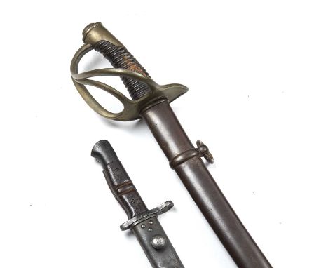 A French Light Cavalry sabre, blade numbered 1190, 92cm in length, with original scabbard together with a bayonetAt present, 