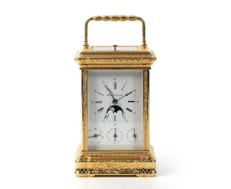 A modern L'epée gilt brass carriage clock retailed by Mappin &amp; Webb with white enamel Roman dial, Arabic five minutes, ro