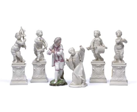 A group of four Nyphemburg porcelain cherub band figures 17cm high a Nymphenburg easten figure, no 287 13cm high and a Hochst