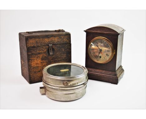 An early 20th century oak cased mantel timepiece, with a 10cm silvered dial and single train movement, 25cm high, along with 