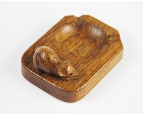 A Robert Thompson of Kilburn 'Mouseman' ashtray, the carved oak ashtray with Thompson's trademark mouse detail, 10cm long 