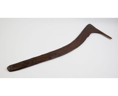 A rare Australian Aboriginal late 19th/early 20th century 'No 7' or 'swan neck' hunting boomerang with rubbed ochre surface, 