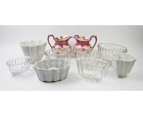 A collection of jelly moulds, to include three ceramic examples by Shelley, with five glass examples and two Wedgwood lustre 