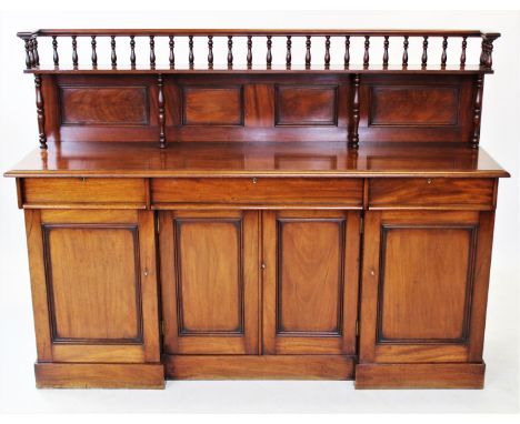 A 19th century mahogany sideboard, the architectural raised back with a spindle gallery above a single shelf, over the rectan