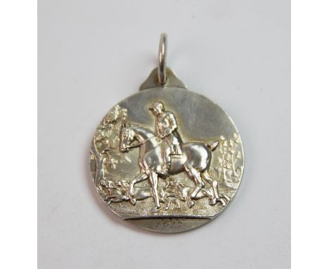 A George V silver medal, Frank Hyams Ltd, Birmingham 1912, inscribed 'Hunters Improvement &amp; National, Light Horse Breedin