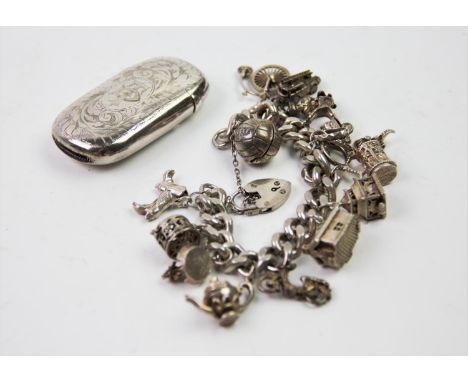 A silver curb link bracelet, 'C B L', Birmingham 1965, suspending a collection of silver and silver plated charms, to include