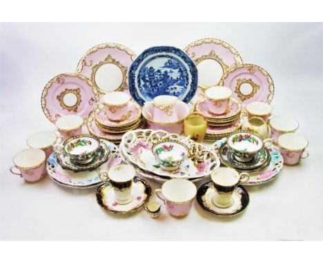 A 19th century continental tea service, the pink service with a white border embellished with gilt, 39 pieces,  four Austrian