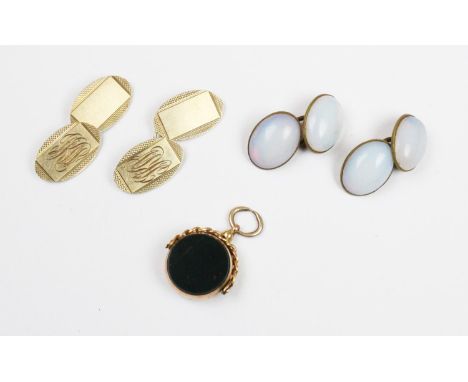 A 9ct gold swivel fob, the circular fob set with bloodstone and sard, hallmarked for Chester 1911, together with a pair of ye