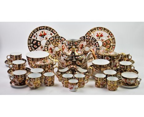 An extensive Royal Crown Derby Imari pattern tea service, the majority pattern number 2451, to include two oval teapots, two 