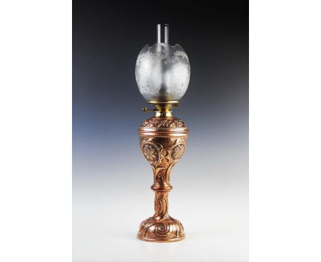 A John Pearson Arts and Crafts copper and brass oil lamp, late 19th century, the base of knopped goblet form with separate oi