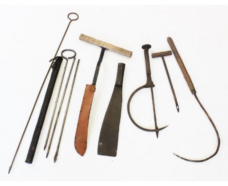 Seven late 19th early 20th century thatching tools, to include various knives, cutters and hooks along with a three section i