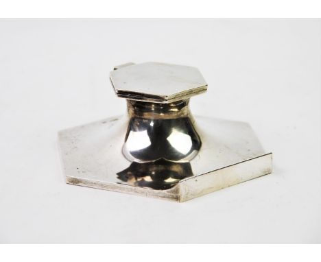 A George V silver inkwell, Walker &amp; Hall, Sheffield 1932, the plain polished body of tapering hexagonal form, with raised