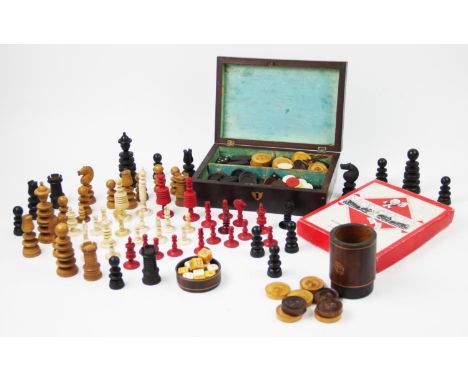 An assorted collection of chess and backgammon pieces, to include; a Jaques style, St George pattern part chess set, a Washin