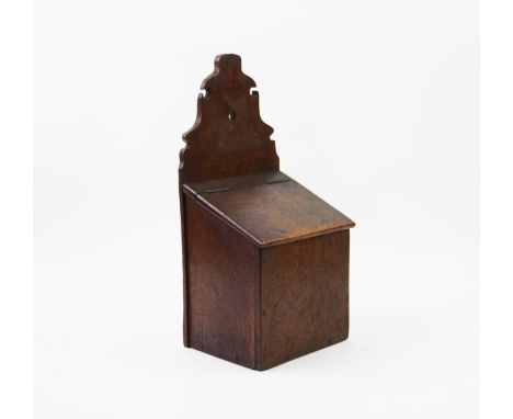 A 19th century oak candle box of tapering form, 38cm high, along with a treen bowl, a treen three tier spice tower, a boxed s