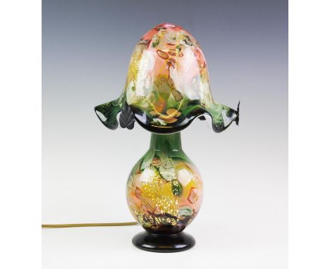 A table lamp in the manner of Monart, the aventurine glass lamp and shade, in pink and green tones, of baluster form and with