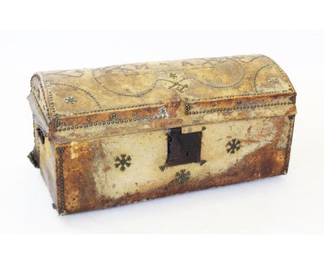 An 18th century pony skin trunk, the domed hinged cover applied with stud work and the initials 'M A A ', fitted with an iron