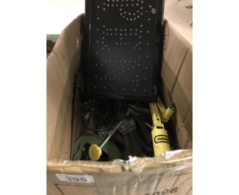A quantity of tools and open light up sign.