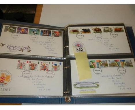 An album of approximately eighty first day covers. 