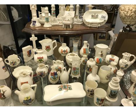 A quantity of ceramic items with city and town crests