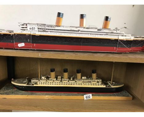 Two model ships, one made from card.